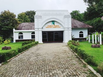 Entrance of historic building against sky