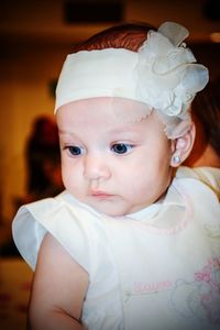 Portrait of cute baby girl at home