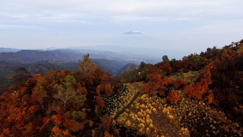 Scenic view of mountains against sky during autumn