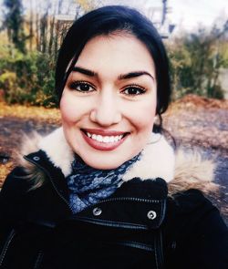 Portrait of smiling young woman