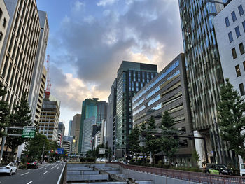 Modern buildings in city against sky