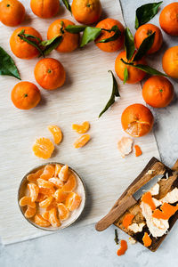 High angle view of orange fruits on table