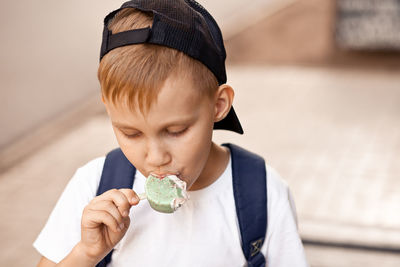 Boy holding ice cream