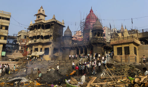 Group of people in front of historic building