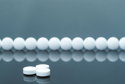 Close up of pills against gray background