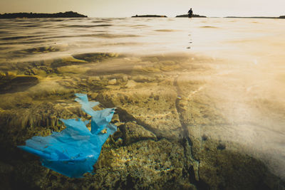 Plastic in sea at beach