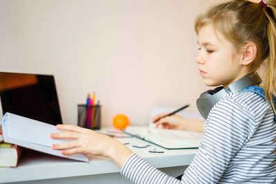 Girl studying at home