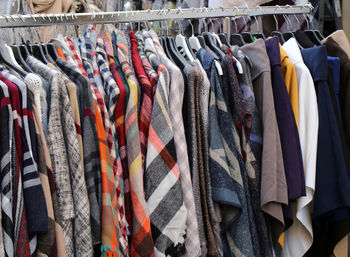 Clothing hanging in store for sale at market