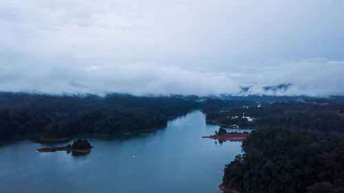 Aerial view of kenyir lake during blue hour sunrise.