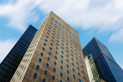 Low angle view of modern building against sky