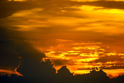 Low angle view of dramatic sky during sunset