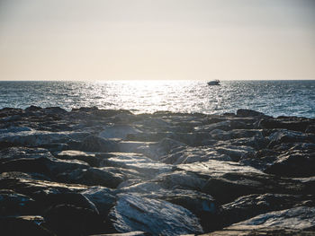 Scenic view of sea against clear sky