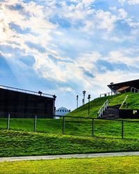 House on field against sky