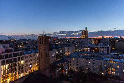 High angle view of buildings at night