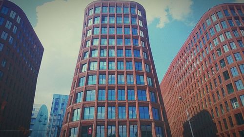 Low angle view of modern building against sky