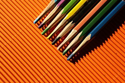 High angle view of multi colored pencils on table