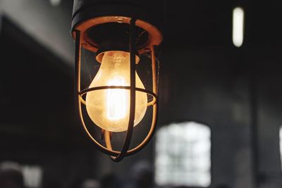 Low angle view of illuminated light bulb