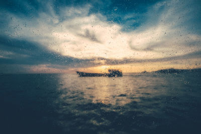 Scenic view of sea at sunset