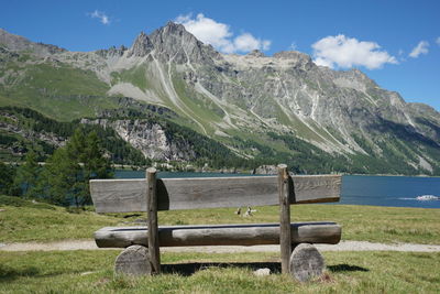 Calm lake in front of mountains