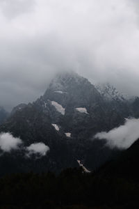 Scenic view of mountains against sky during winter