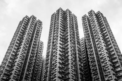 Low angle view of modern buildings against sky