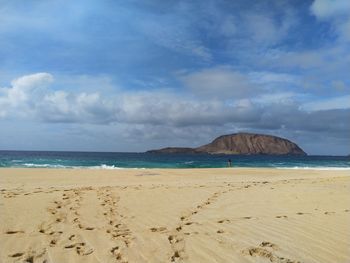 Scenic view of beach against sky