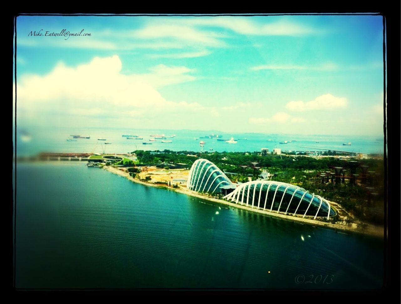 transfer print, auto post production filter, water, sea, sky, horizon over water, cloud - sky, blue, built structure, architecture, cloud, beach, panoramic, waterfront, scenics, nature, building exterior, travel destinations, outdoors, reflection