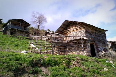 Abandoned house against sky