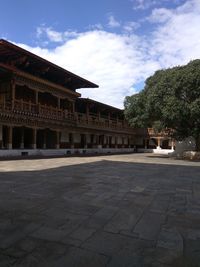 View of historical building against cloudy sky