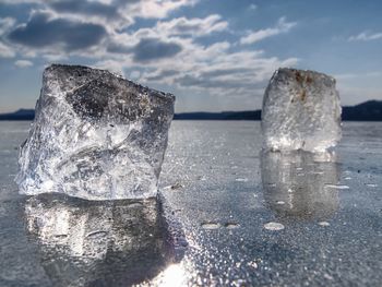 Frozen lake. studying of climatic and weather changes. piece of ice with light reflections.