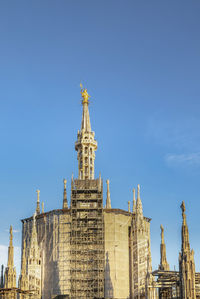 Low angle view of historic building against clear sky