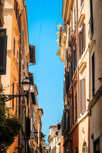 Low angle view of buildings against clear sky