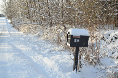 Close-up of text on snow