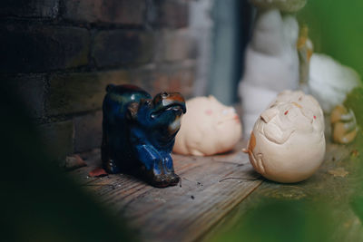 Close-up of statue on table