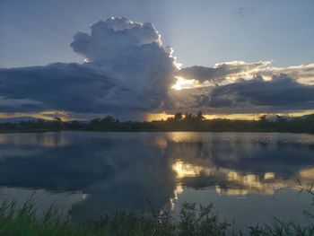 Scenic view of lake against sky during sunset