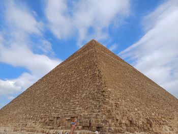 Low angle view of built structures against sky