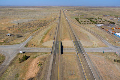 High angle view of road passing through land