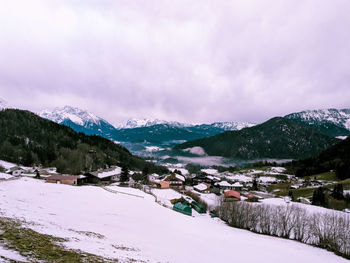 Scenic view of mountains against sky during winter