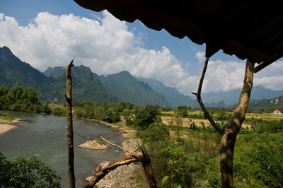 Scenic view of landscape and mountains against sky