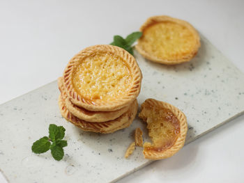 Cake of pie. custard tarts or pie susu on marble board . selective focus