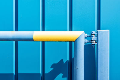 Close-up of blue metal door