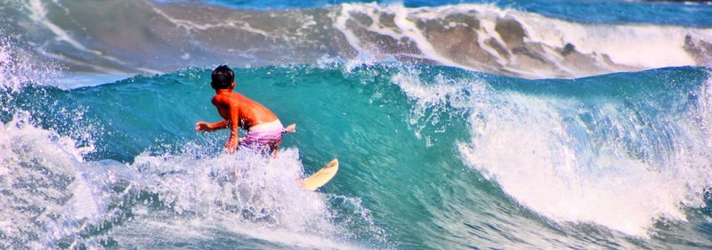 Man surfing in sea