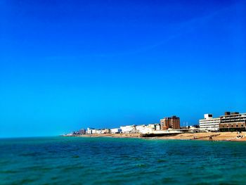 View of calm blue sea against clear sky