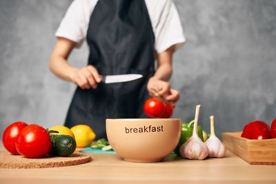 Midsection of woman preparing food