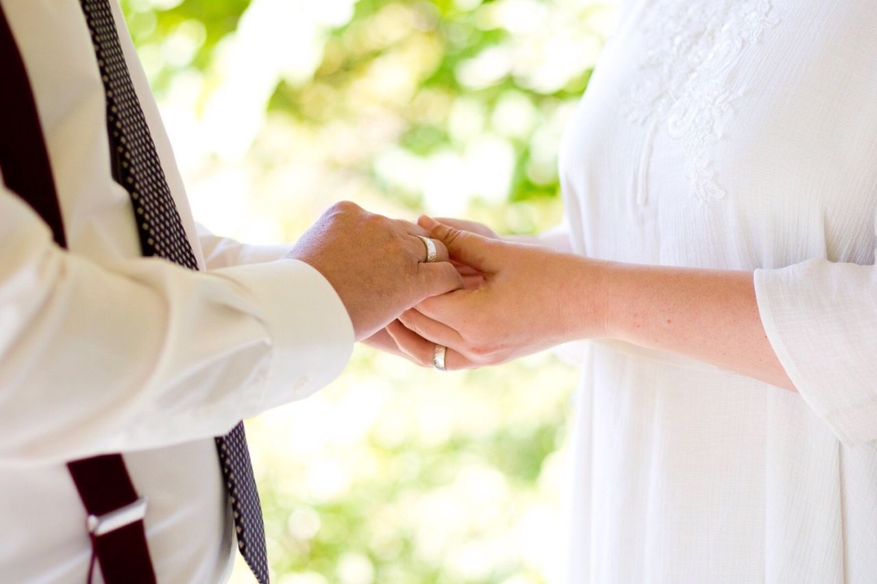 two people, men, real people, togetherness, human hand, human body part, love, women, indoors, day, bride, bonding, close-up, bridegroom, adult, people