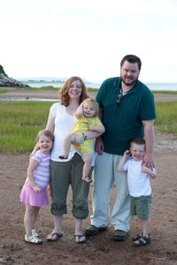 Full length portrait of a smiling young couple