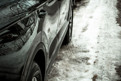 Close-up of car on street