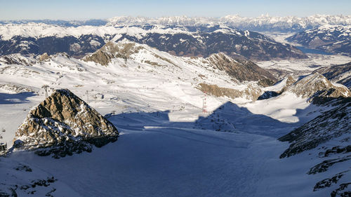 Diminishing perspective view of winter rocky mountain range of sunny austrian alps