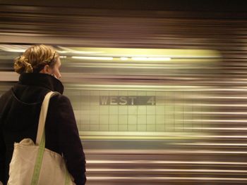 Woman in subway train