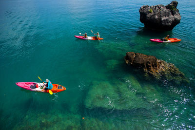 High angle view of people in sea